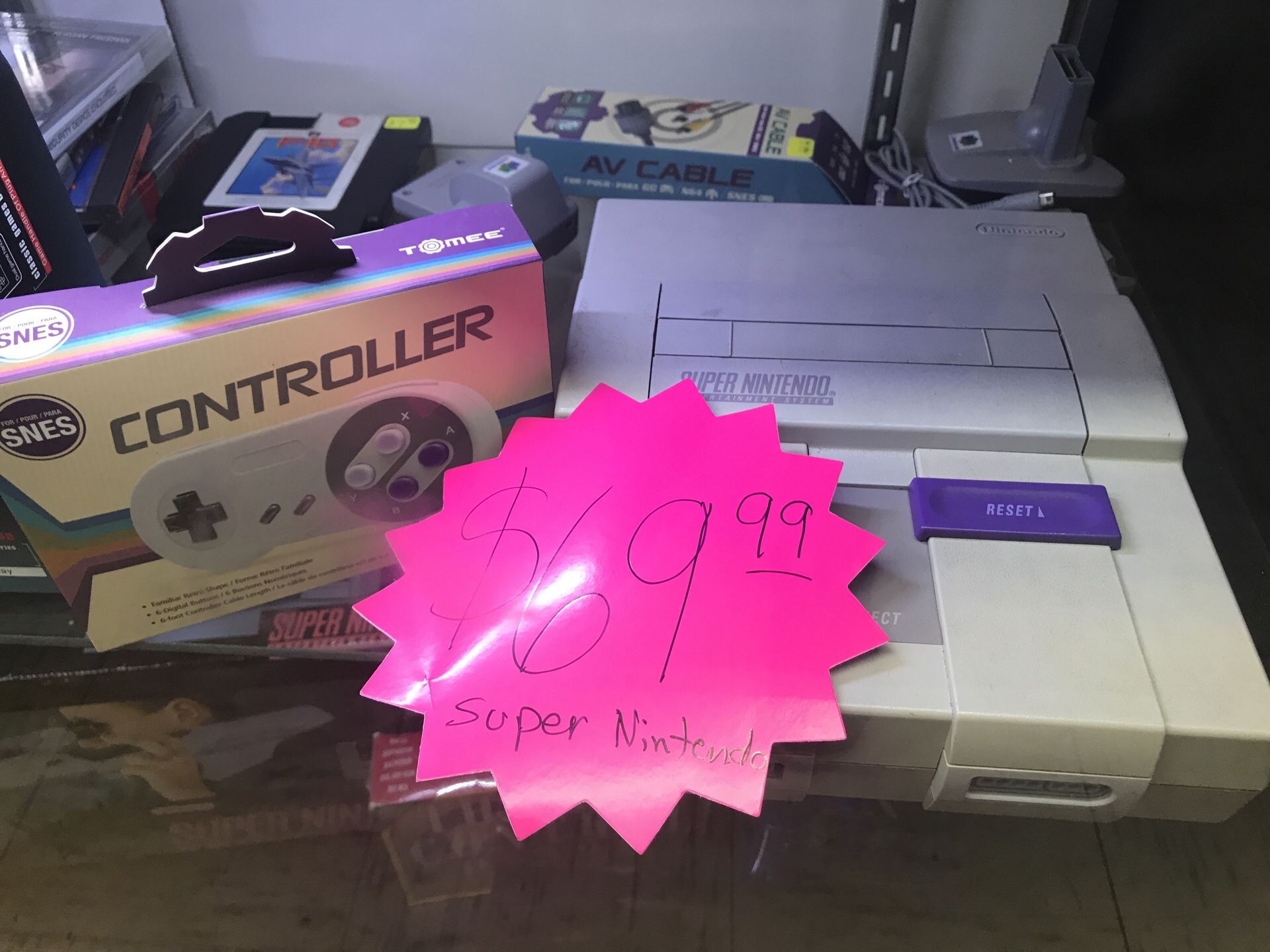 Super Nintendo system with cables and controller
