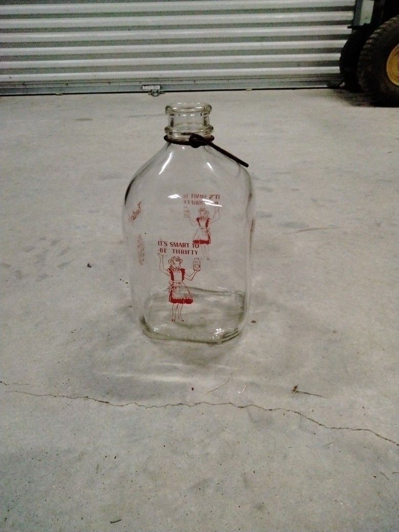 RARE Antique Rare Find Bordens One Gallon Milk Bottle.. Four sides rare find. Metal Handle.