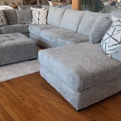 New sectional Sofa with ottoman and pillows