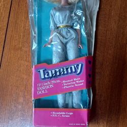 Tammy fashion doll from early 1980s , 11.5 inches high blond hair, new in damaged box