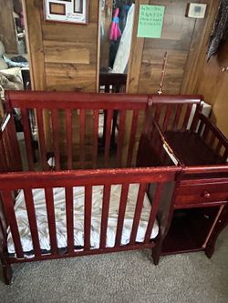 Baby Mini Crib Wooden and attached baby changer
