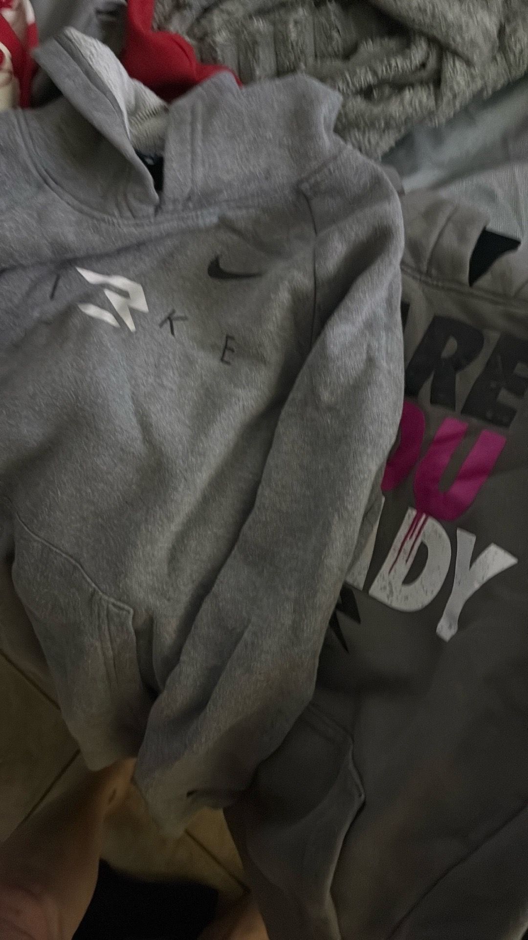 Tons of hoodies a 3 set of pjs 6 shirts a pair of shorts and some sweats and sweaters size large 10/12 boys
