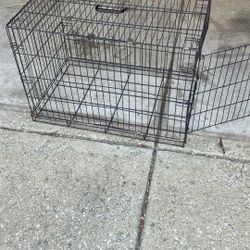 Travel Dog Cage    34 “Long 22”wide 24”high 