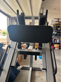 Hoist leg press and hack combo machine