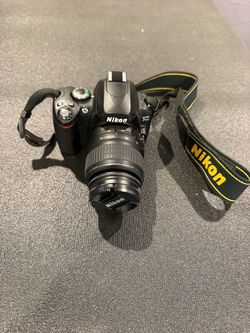 Nikon D40 digital SLR camera with 18-55 and 55-200 lenses external flash  filters and lowepro backpack