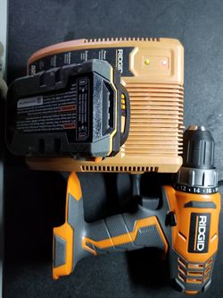 Rigid drill and battery with charger