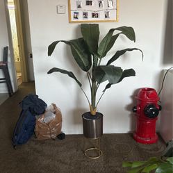 fake plant with pot