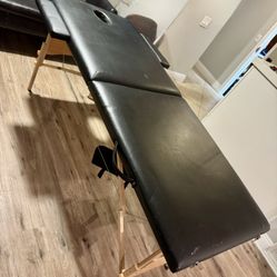 Black portable massage table