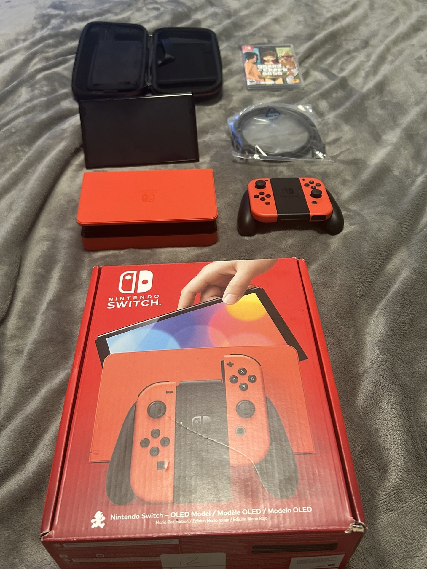 Like New Nintendo Switch - OLED Model: Mario Red Edition with travel case& Grand theft auto trilogy 