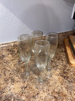 4 champagne glasses