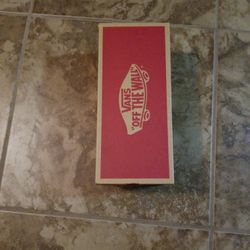 Iridescent Van's Checkered Shoes.