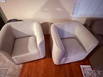 2 Swivel Chairs