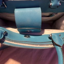 Teal Michael Kors bag with belt
