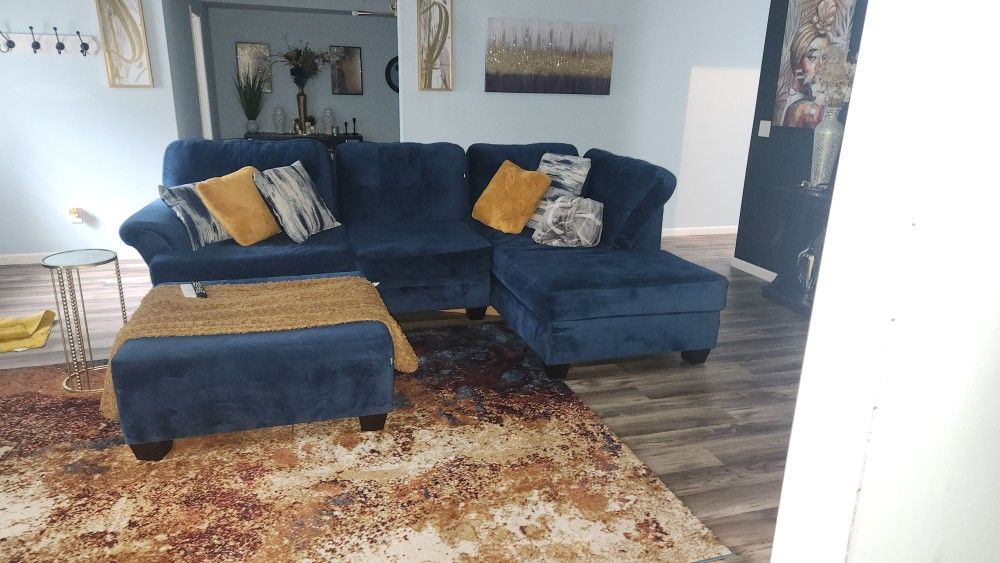 Blue Sectional And Ottoman