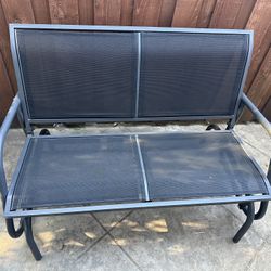   black swinging bench