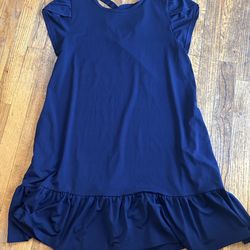 Navy blue babydoll dress with ruffle hem and cross back detail size medium