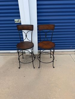 Two like new Bar height chairs-black iron bars, brown seats - quality