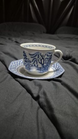 Tea cups and tiny plate