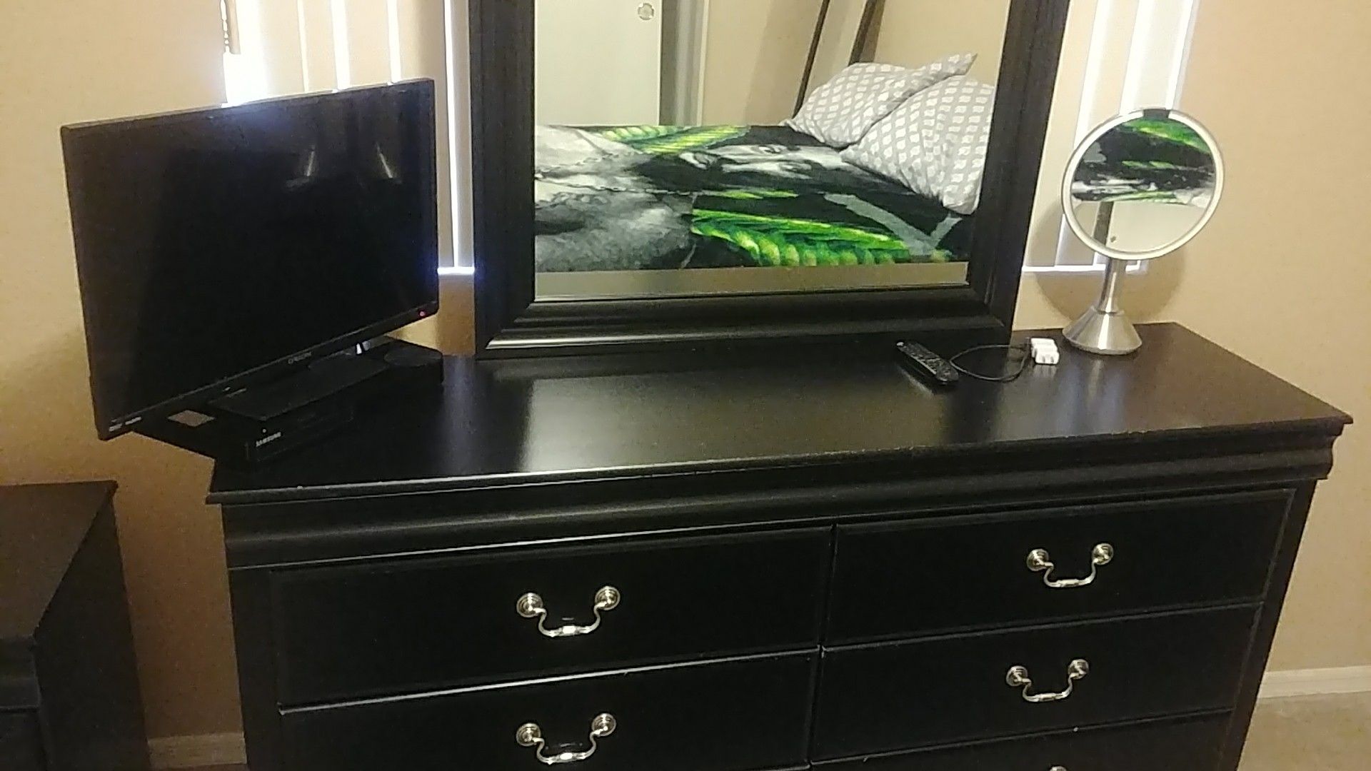 Dresser with mirror and night stand.