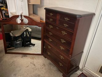 Chest of drawers and mirror