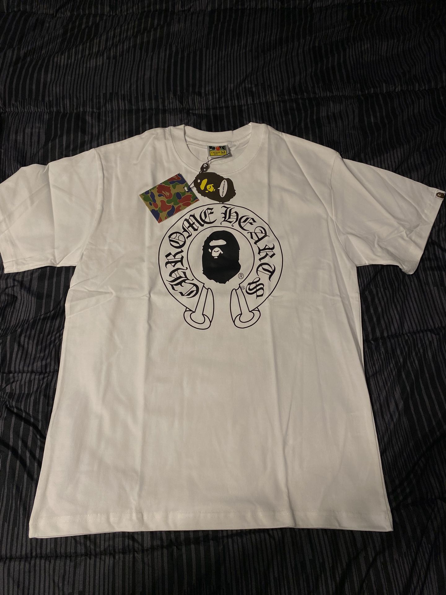 White bape/chrome hearts shirt.