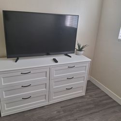 50 inch Samsung TV with clothes drawer like new!!