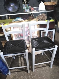 Two nice wooden woven chairs
