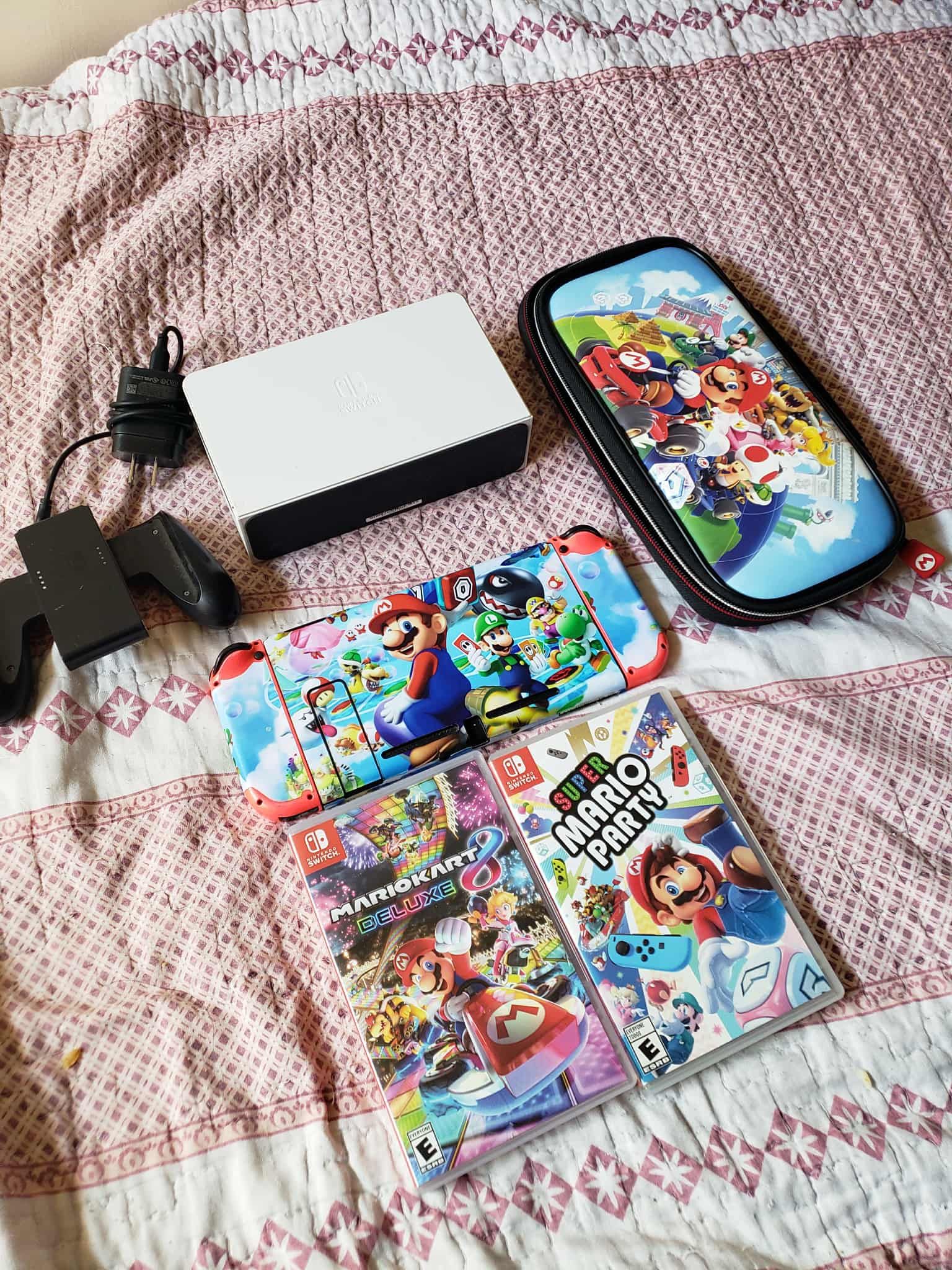 Super Mario Bros Nintendo Switch V2 128GB 2020 with 0 Games & all The rest it come included $200! $40! Per Game. Total $260! All combo