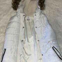 white faux fur puffer vest