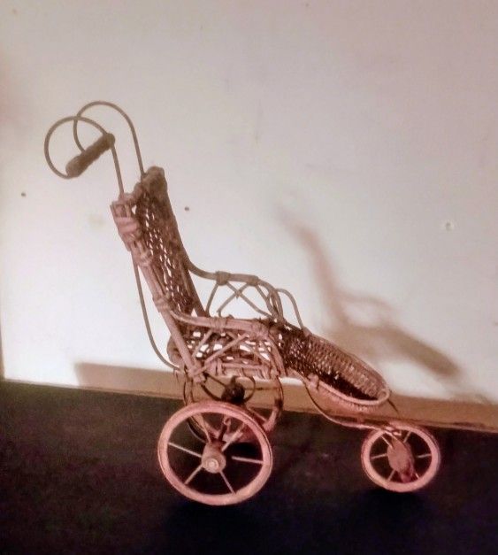 A 19th Century Wicker & Metal Doll Carriage
