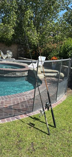 TWO (2) Saltwater Fishing Rods with Reels (7'0" & 7'6")