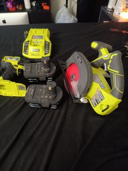 RYOBI SET BATTERIES AND CHARGER.