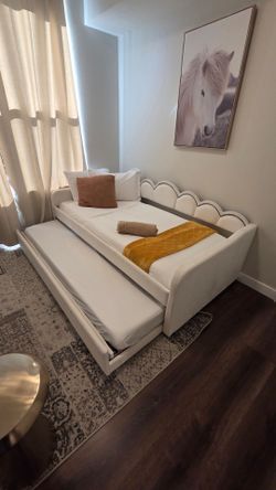 Twin size bed with pull out bed underneath (2 beds)