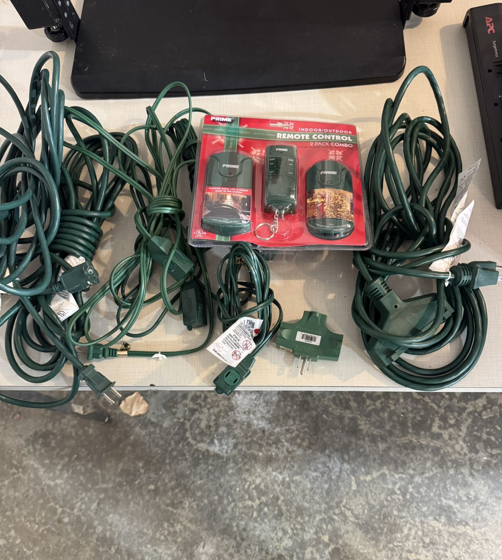Several Outdoor Green Extension Cords