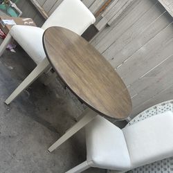 Table /.  2 Chairs