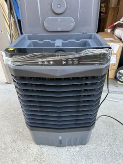 New condition large evaporative cooler or swamp cooler on wheels with remote