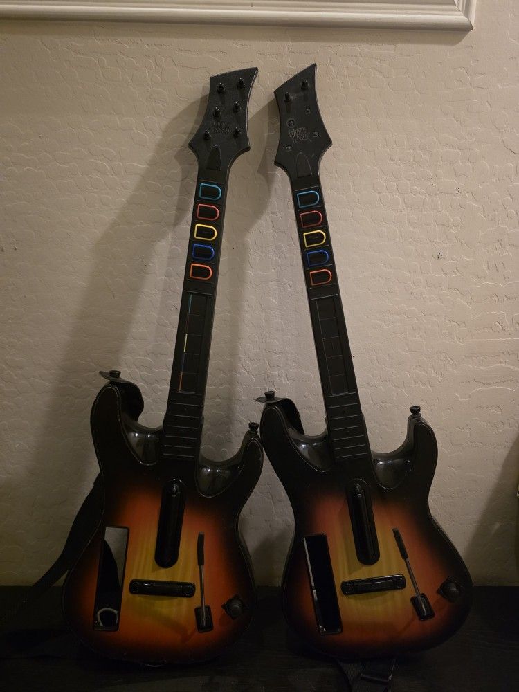 Two Guitar Hero Sunburst Guitars for the Nintendo Wii Console