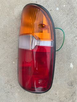 New 1(contact info removed) Toyota tacoma tail light parts