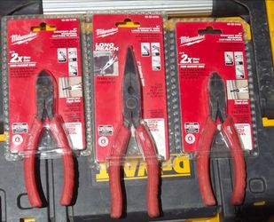 Three sets of Milwaukee tools