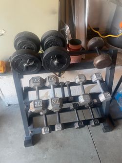 Rack and  weights 210 pounds
