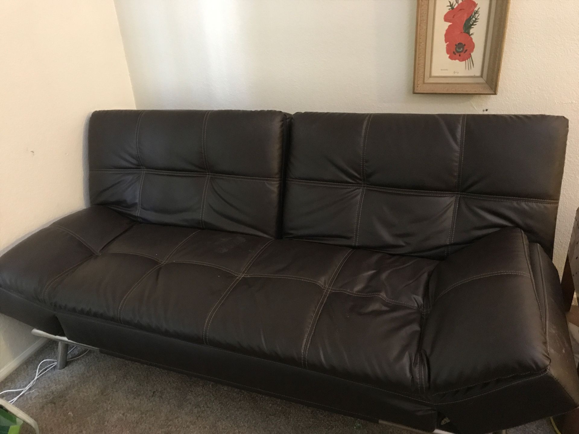 Leather couch/ futon