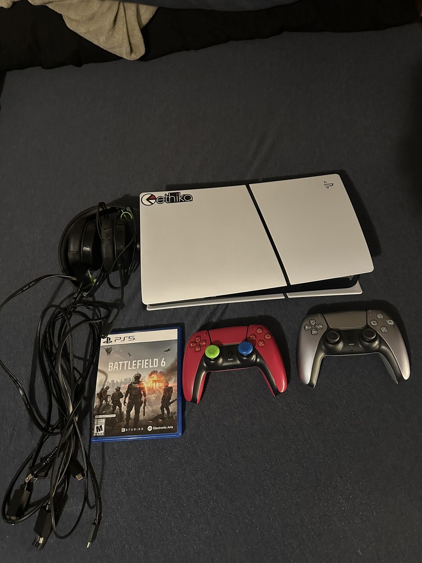 Playstation 5 Slim w/ 2 Remotes & BF6 !