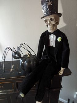 Dapper Halloween skeleton & glitter spider decor