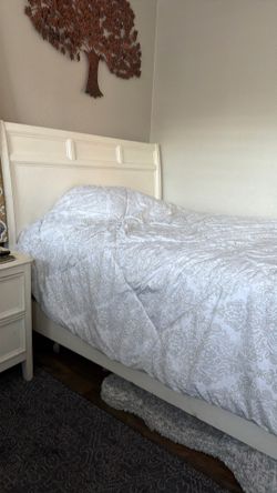 White wood bed full size.