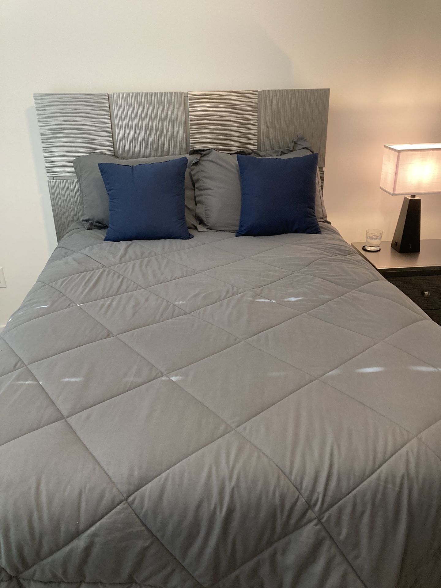 Like new: full-size bed, mattress, boxspring, and mattress cover.