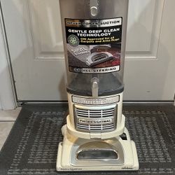 Used Shark upright bagless vacuum with 1 attachment. Model NV370. Lift-away. Corded. Works good. Clean unit.