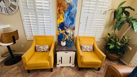 Beautiful Carocc accent chairs witnailheads and solid wood yellow lines