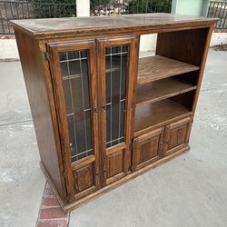Oak cabinet with leaded glass