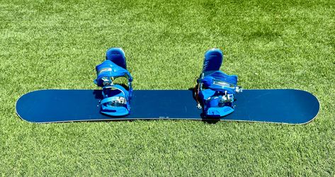 Snowboard with bindings and bag