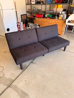 BLACK OTTOMAN like new